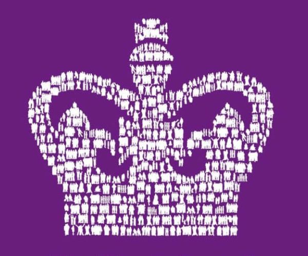 Picture shows the logo for the King's Award: it is the shape of a crown made up of small figures of people, set against a purple background