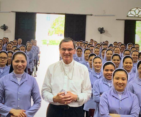 Photo of Bishop John with The Holy Cross novices