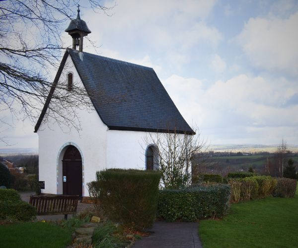 A photo of the small, white chapel of the Schoenstatt shrine at St John Fisher's parish in Kearsley
